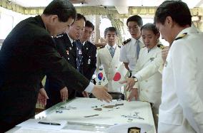 Japan, S. Korea hold joint maritime rescue, cleanup drill